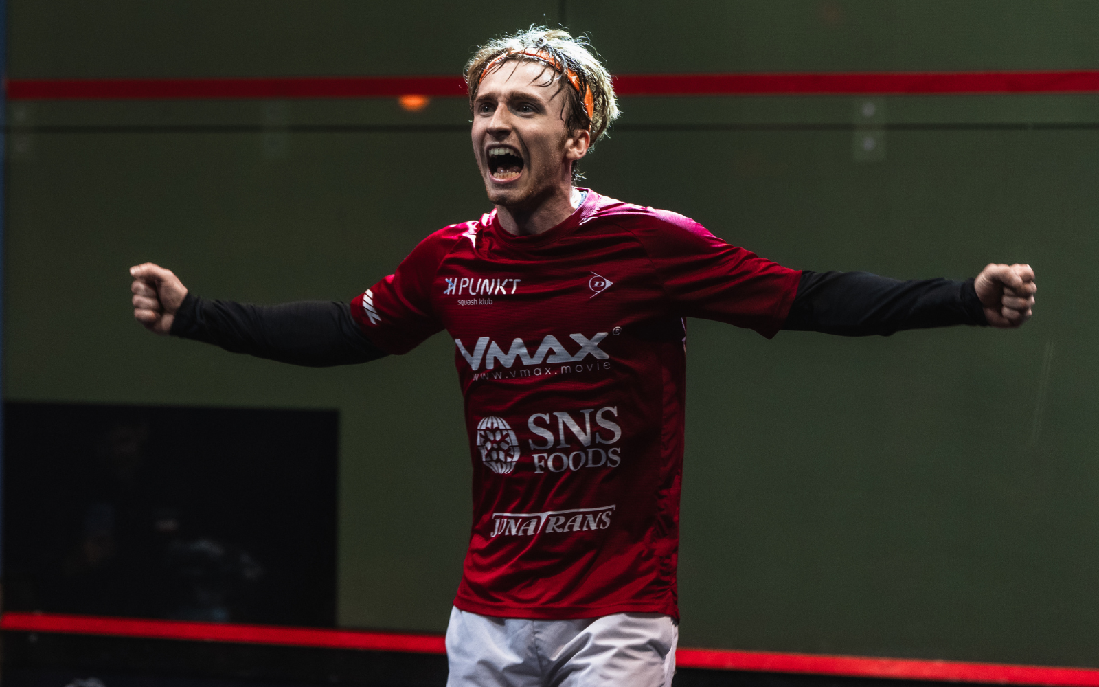 Elite squash player competing on court